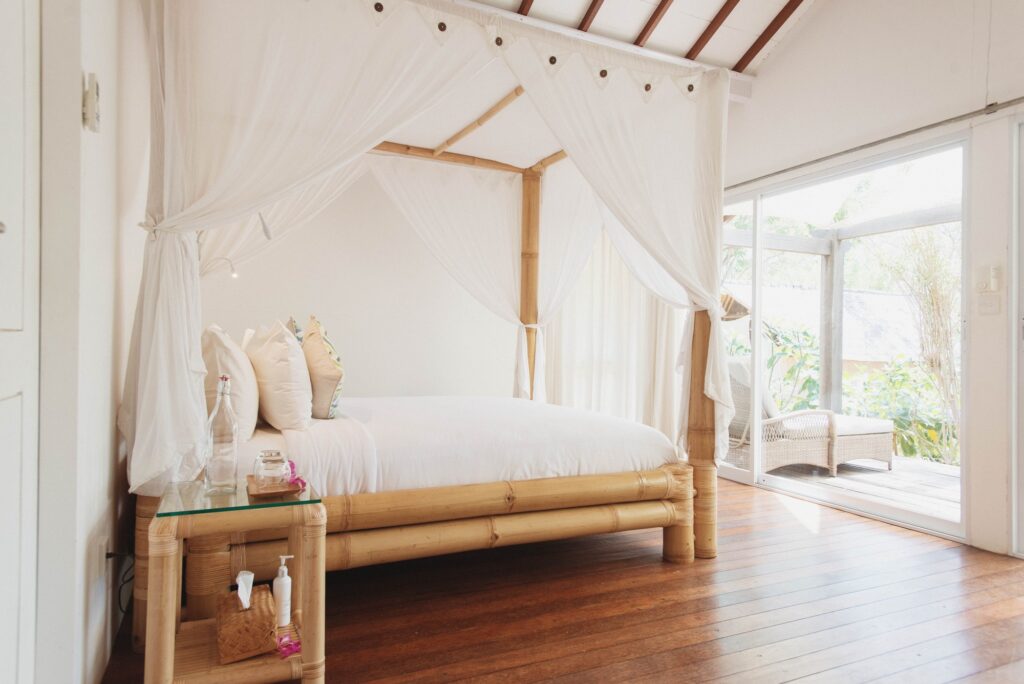Bright bedroom with canopy bed